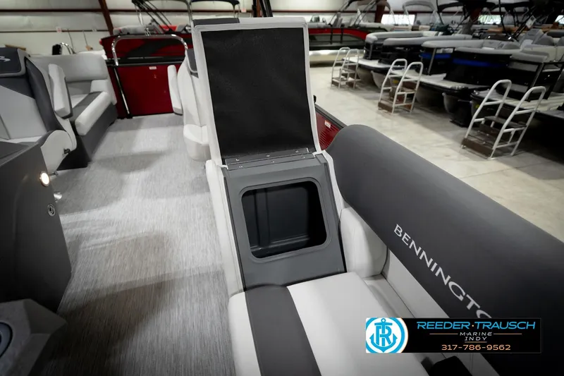 Slide: The Image of 2026 Bennington 20 SSR pontoon boat interior with gray and white seating, showroom display. - 23