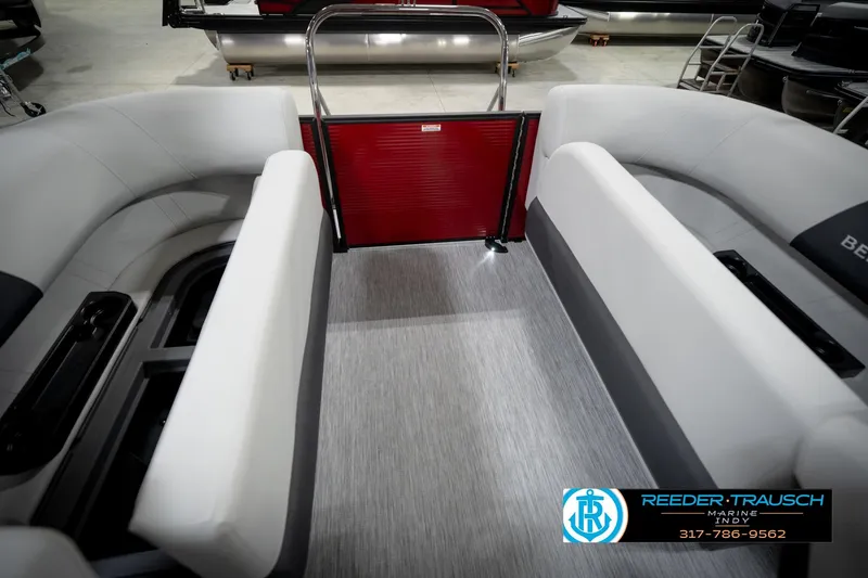 Slide: The Image of 2026 Bennington 20 SSR pontoon boat interior with gray seating and red gate. - 27