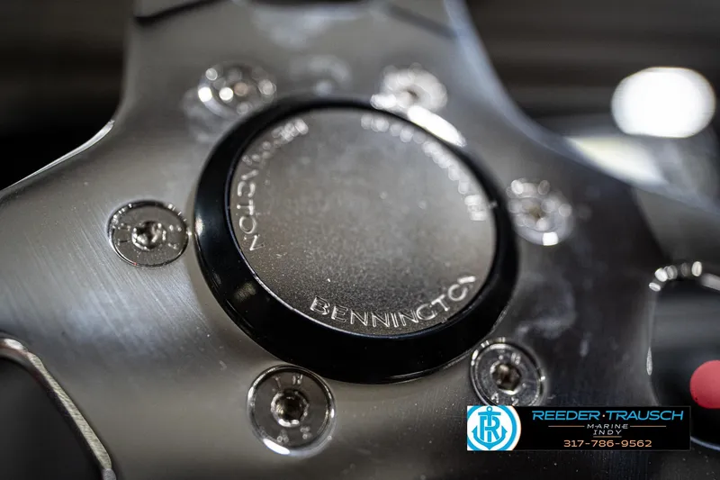 Slide: The Image of 2026 Bennington 20 SSR boat dashboard with steering wheel and control panel. - 30