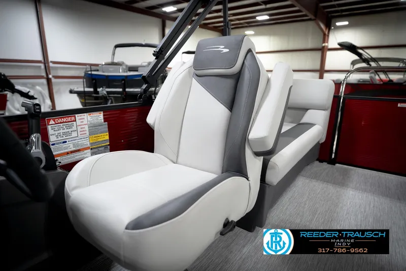 Slide: The Image of Cup holders on a 2026 Bennington 20 SSR boat, featuring a sleek red and white design. - 40