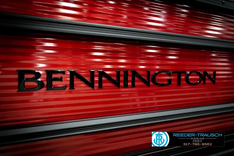 Slide: The Image of Red Bennington 20 SSR 2026 boat with sleek black logo and Reeder-Trausch Marine contact details. - 46