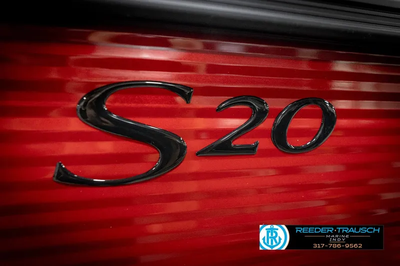 Slide: The Image of Close-up of 2026 Bennington 20 SSR logo on red background, Reeder-Trausch Marine contact info visible. - 47