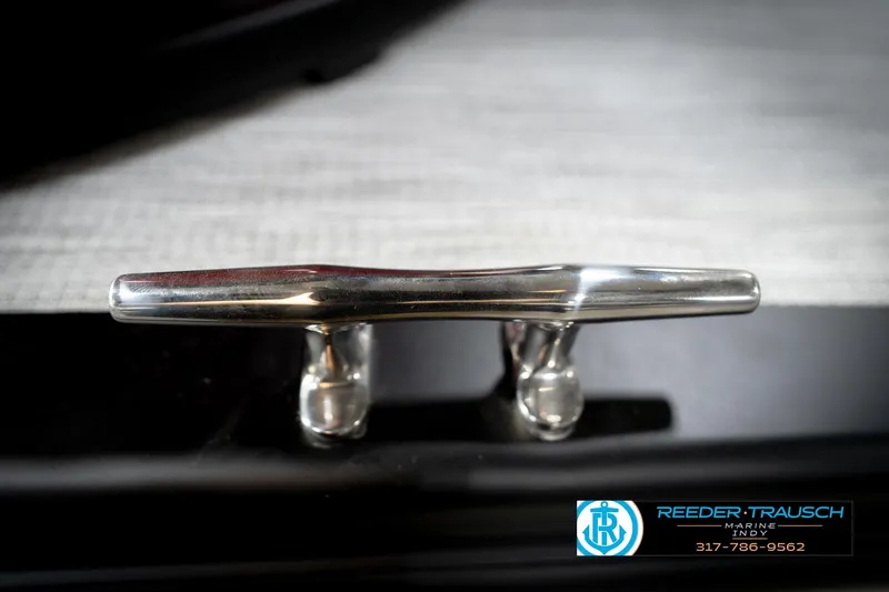 Slide: The Image of Close-up of 2026 Bennington 20 SSR logo on red background, Reeder-Trausch Marine branding visible. - 48