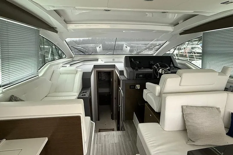 Slide: The Image of Luxurious interior of 2020 Cruisers Yachts 42 Cantius with modern helm and seating. - 7