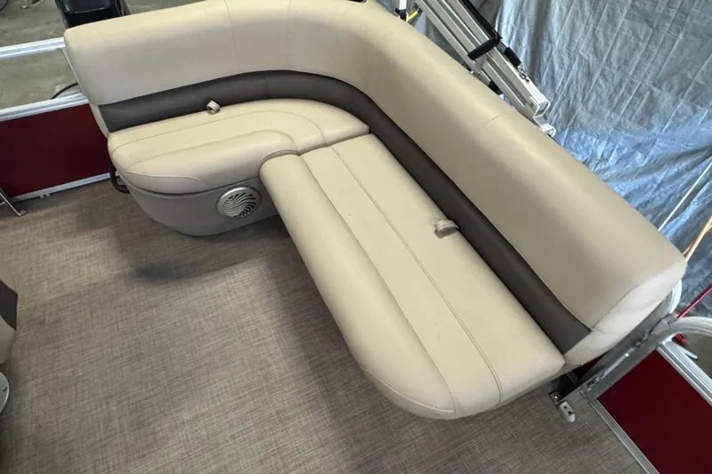 Slide: The Image of 2023 Sun Tracker Bass Buggy 16 XL Select boat seating, beige upholstery, and integrated speaker. - 9