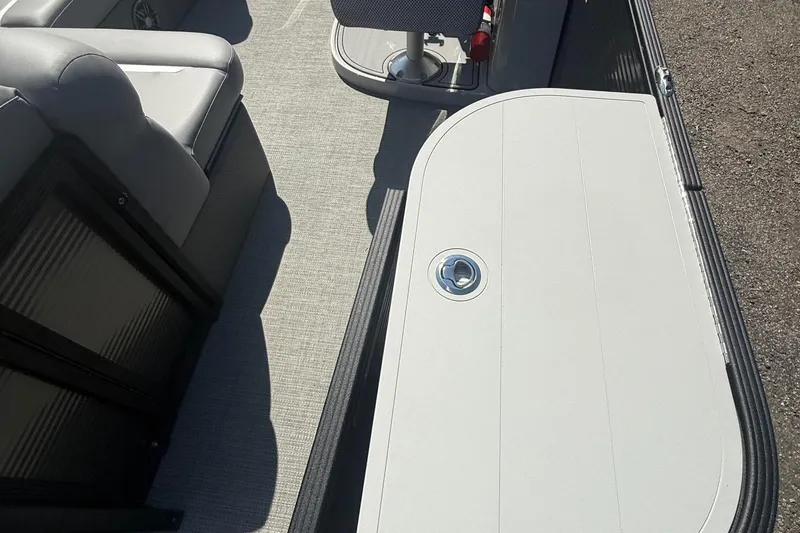 Slide: The Image of Interior of 2025 Crest Classic 200 boat with seating and flooring details. - 12