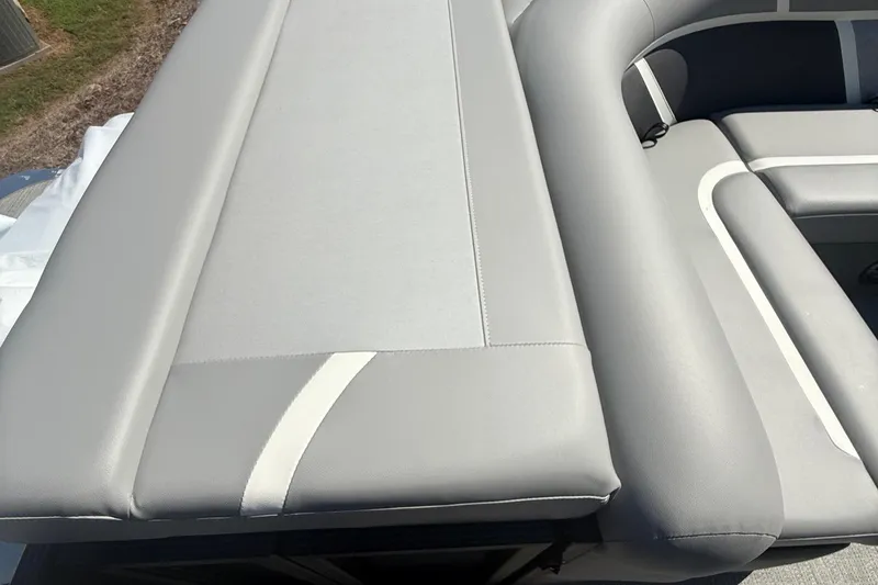 Slide: The Image of 2025 Crest Classic 200 boat with sleek gray seating and modern design. - 8