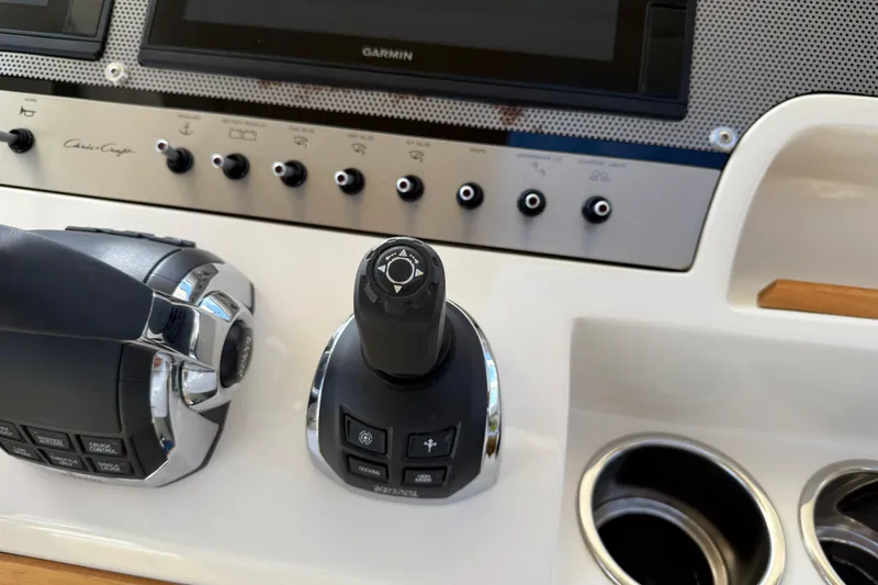 Slide: The Image of Control panel of 2018 Chris-Craft Commander 44 with joystick and throttle. - 21
