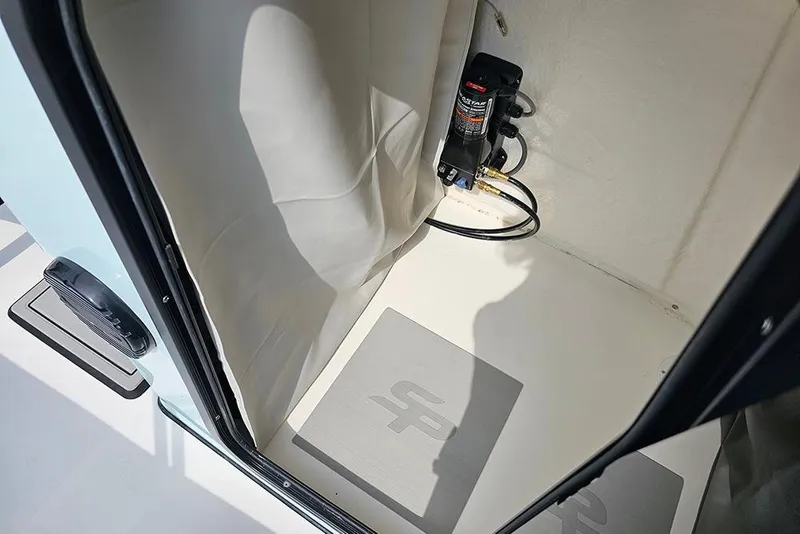Slide: The Image of Interior view of 2026 Sea Pro 202 Center Console boat compartment. - 18