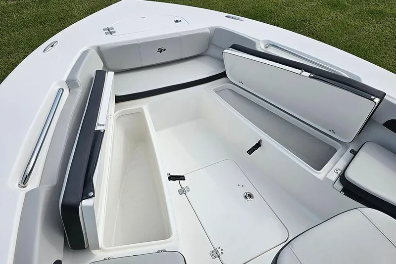 Slide: The Image of 2026 Sea Pro 202 Center Console boat interior with open storage compartments. - 23
