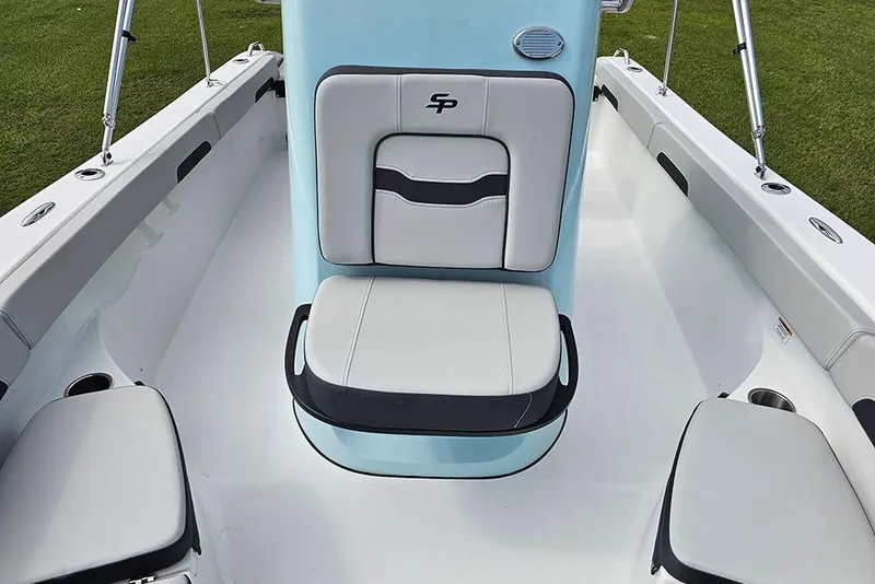 Slide: The Image of 2026 Sea Pro 202 Center Console boat interior with cushioned seating and sleek design. - 27