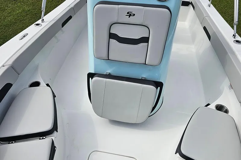 Slide: The Image of 2026 Sea Pro 202 Center Console boat interior with cushioned seating and sleek design. - 28