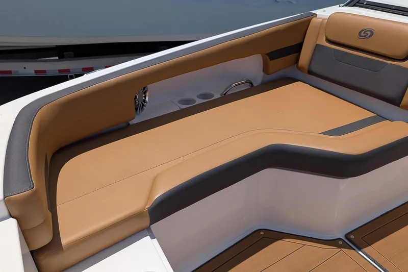 Slide: The Image of 2023 Hurricane SunDeck 235 OB boat interior with tan and gray seating. - 15
