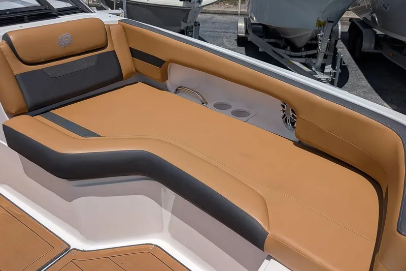 Slide: The Image of 2023 Hurricane SunDeck 235 OB boat interior with tan and black seating. - 16