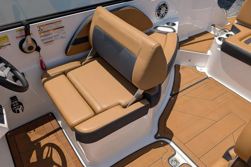 Slide: The Image of 2023 Hurricane SunDeck 235 OB boat interior with tan seating and modern design. - 8
