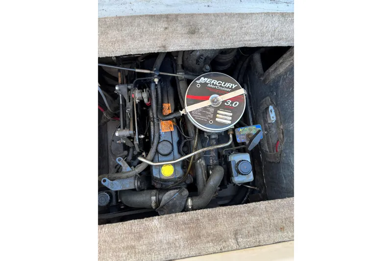 Slide: The Image of Engine compartment of 2000 Crownline 180 BR with Mercury MerCruiser 3.0 engine. - 12