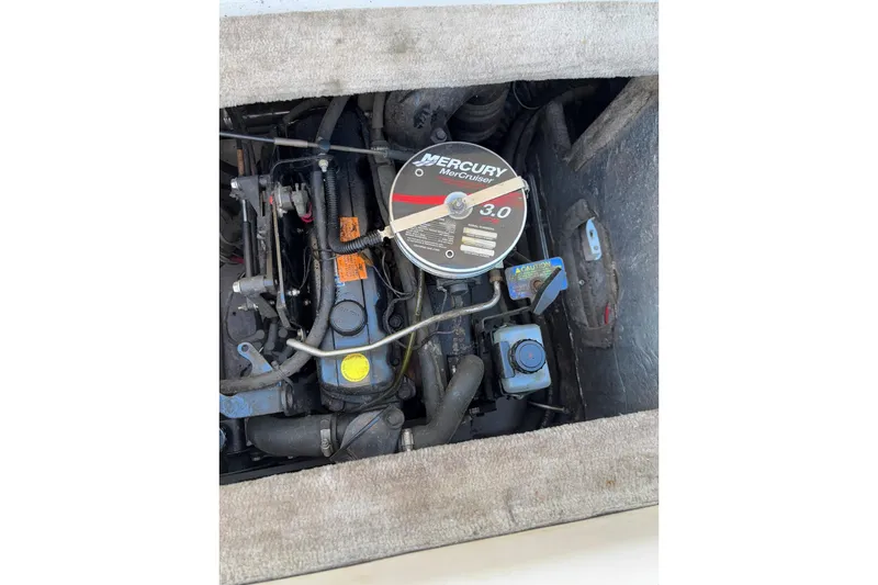Slide: The Image of Engine compartment of a 2000 Crownline 180 BR with Mercury MerCruiser 3.0 engine. - 13