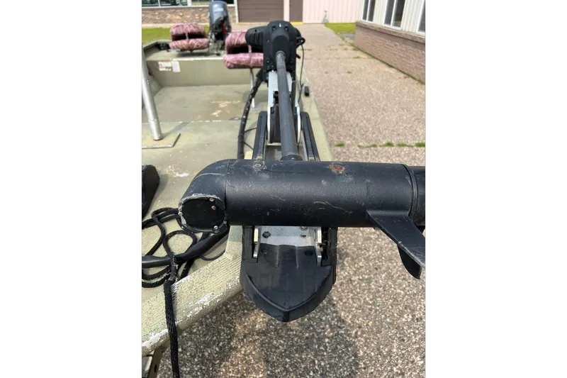 Slide: The Image of 2011 Tracker 1754 boat with trolling motor on a concrete surface. - 11