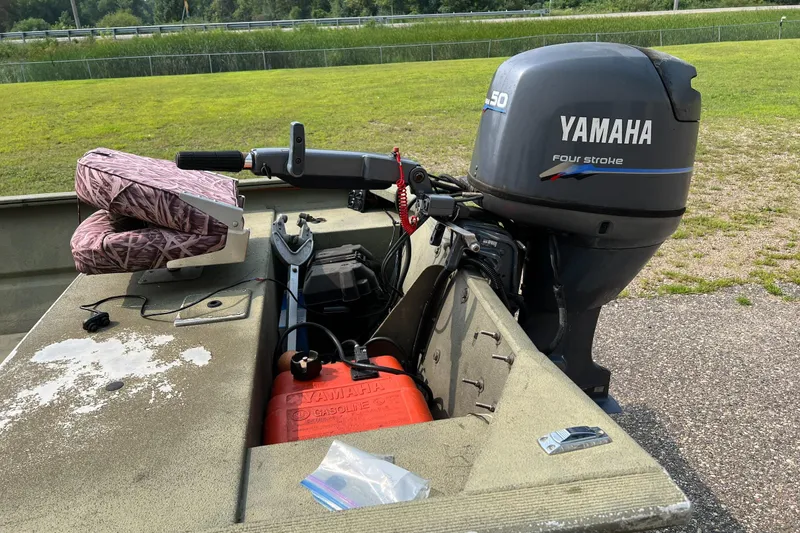Slide: The Image of 2011 Tracker 1754 boat with Yamaha 50HP four-stroke outboard motor. - 12