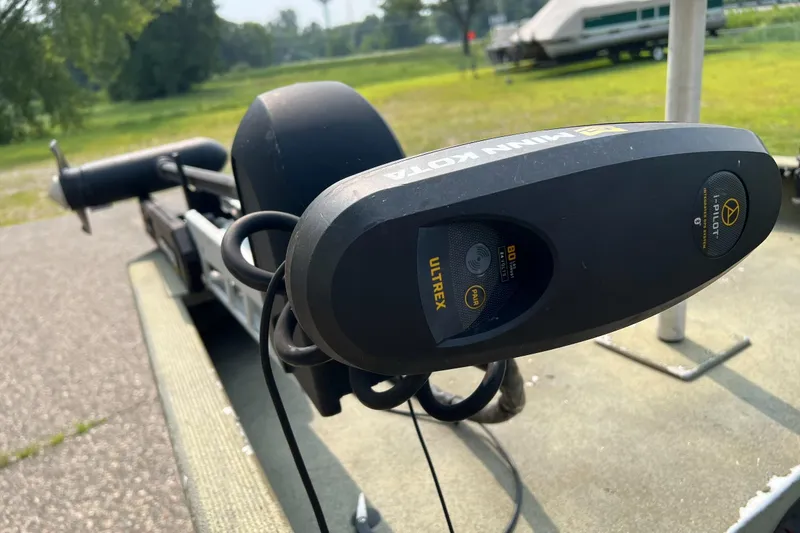 Slide: The Image of Minn Kota Ultrex trolling motor on 2011 Tracker 1754 boat, outdoors. - 6