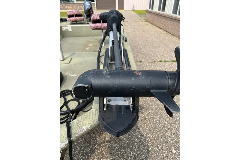 Slide: The Image of 2011 Tracker 1754 boat with trolling motor on a concrete surface. - 8