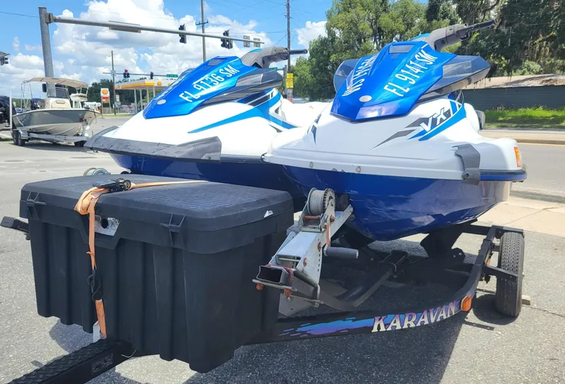 Slide: The Image of 2020 Yamaha WaveRunner VX jet skis on a Karavan trailer, parked on a street. - 1
