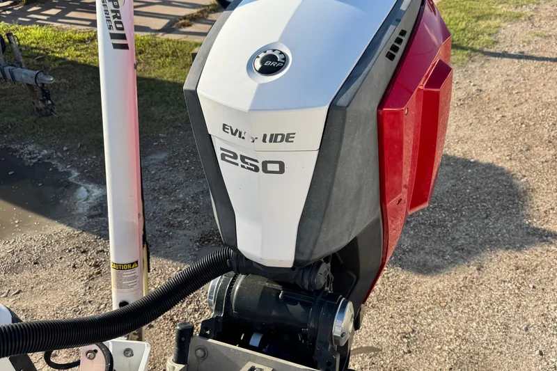 Slide: The Image of Outboard motor on 2015 Epic 22 Sport Console boat, Evinrude 250 model. - 20