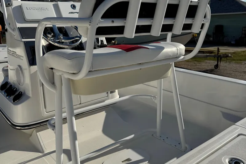 Slide: The Image of 2015 Epic 22 Sport Console boat interior with steering wheel and seating. - 39