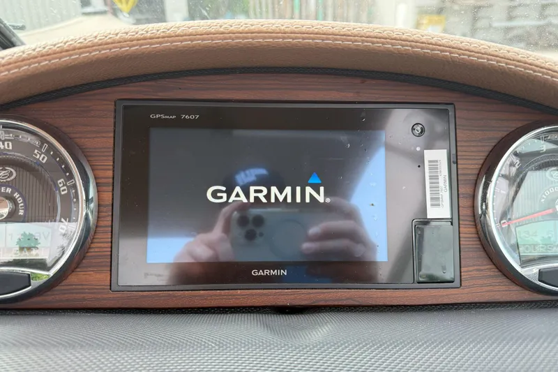 Slide: The Image of Garmin GPS display in 2016 Cobalt 26SD boat dashboard. - 28