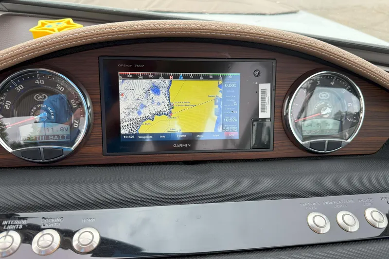 Slide: The Image of Dashboard of a 2016 Cobalt 26SD boat with Garmin GPS and gauges. - 29