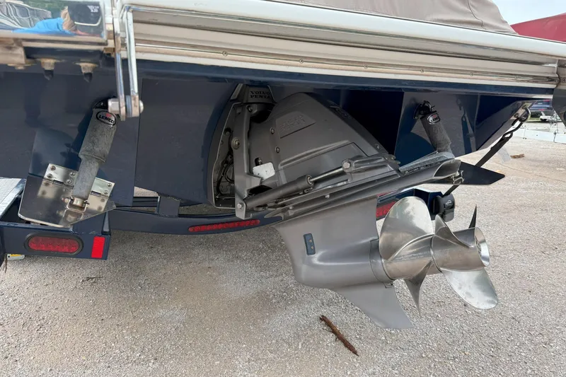 Slide: The Image of Rear view of a 2016 Cobalt 26SD boat with Volvo Penta outdrive. - 3