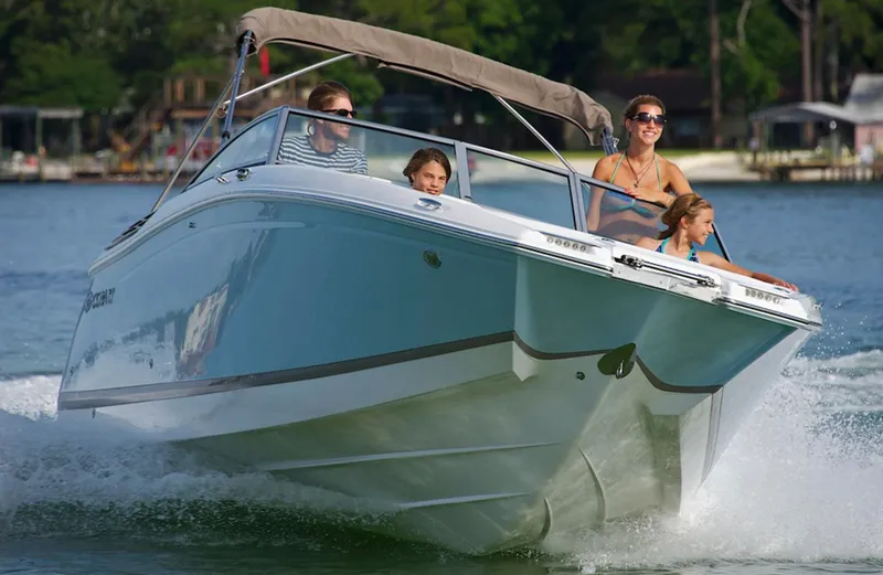 Slide: The Image of Manufacturer Provided Image: 2016 Cobalt 26SD boat cruising on a lake with passengers. - 5