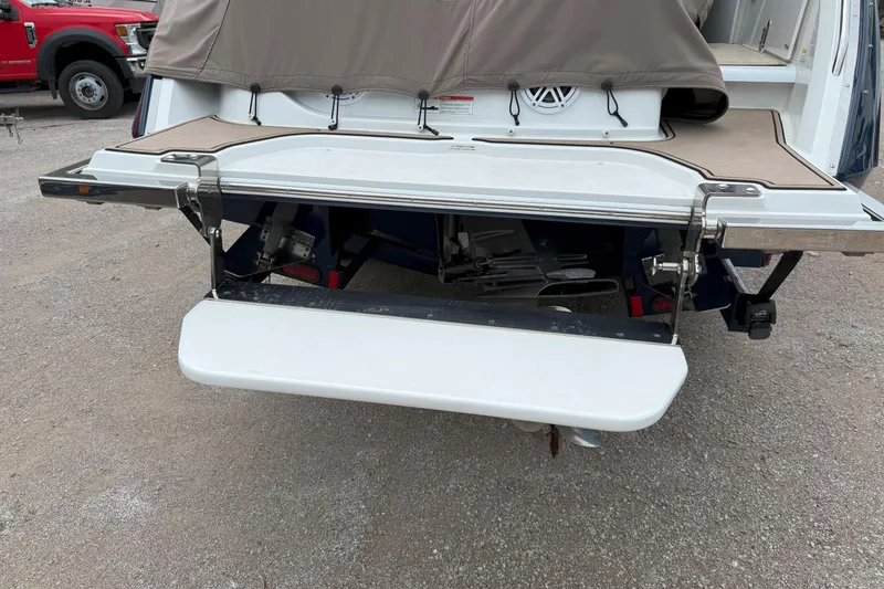 Slide: The Image of 2016 Cobalt 26SD boat with extended swim platform and covered rear deck. - 7
