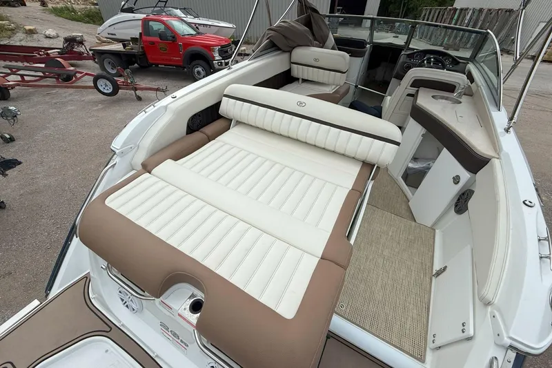 Slide: The Image of 2016 Cobalt 26SD boat interior with luxurious seating and modern amenities. - 8