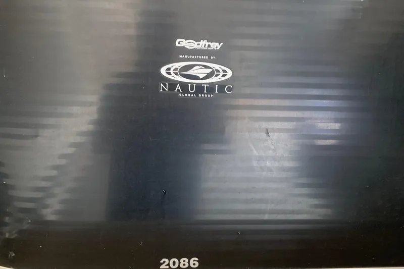 Slide: The Image of Sweetwater 2086 2012 model, manufactured by Nautic Global Group, Godfrey logo visible. - 4