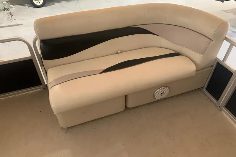 Slide: The Image of Cream and black boat seating on 2012 Sweetwater 2086 pontoon. - 6