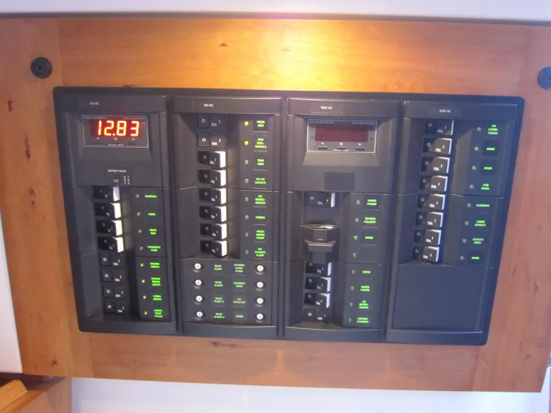 Slide: The Image of Electrical control panel on a 2011 Back Cove 30 boat. - 12