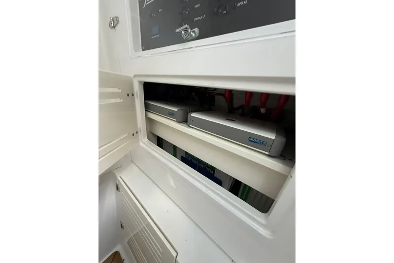 Slide: The Image of Electrical panel and components inside a 2021 Jupiter 38 HFS boat. - 25