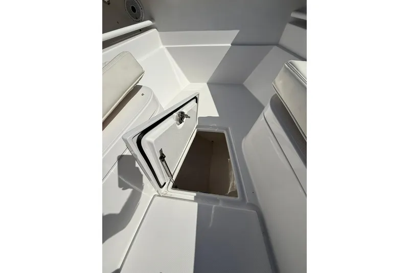 Slide: The Image of Open storage compartment on 2021 Jupiter 38 HFS boat deck. - 37