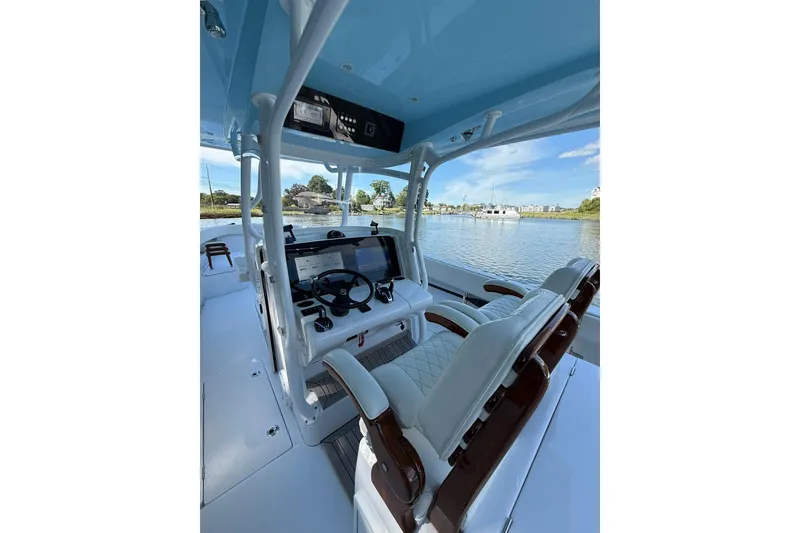 Slide: The Image of Interior view of 2021 Jupiter 38 HFS boat with modern helm and seating. - 44