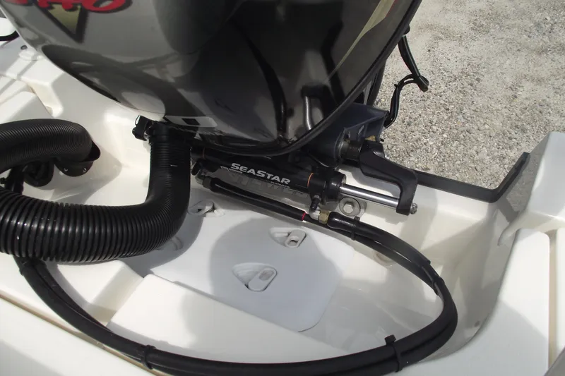 Slide: The Image of 2024 Hewes Redfisher 16 boat engine with SeaStar hydraulic steering system. - 24