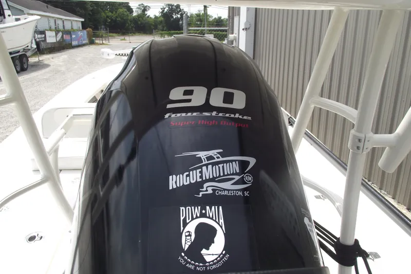 Slide: The Image of 2024 Hewes Redfisher 16 boat engine with Rogue Motion and POW-MIA decals. - 25