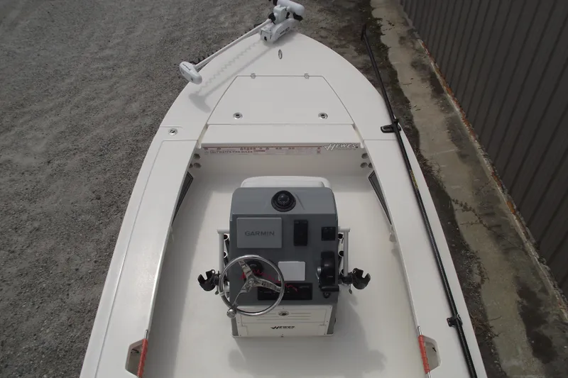 Slide: The Image of 2024 Hewes Redfisher 16 boat interior with Garmin navigation system, top view. - 5