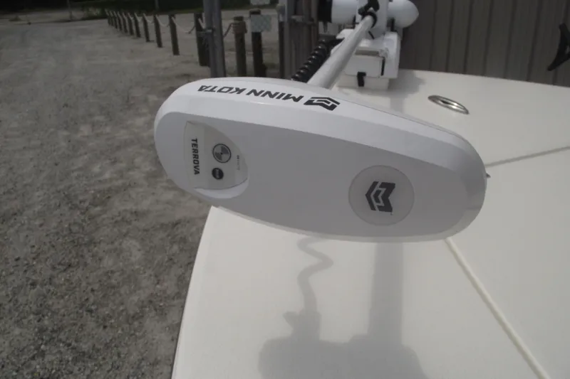 Slide: The Image of Minn Kota Terrova motor on 2024 Hewes Redfisher 16 boat, dockside view. - 7