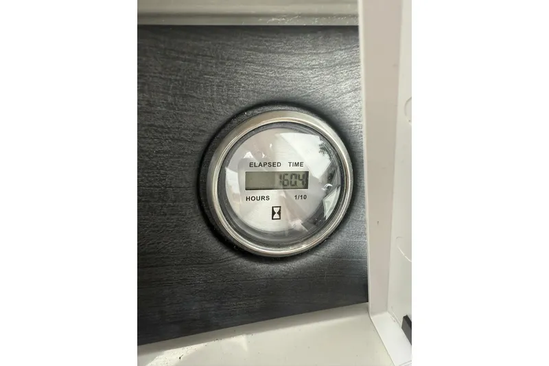 Slide: The Image of Hour meter showing 160.4 hours on 2022 Crest Caribbean LX 230 SLS. - 23