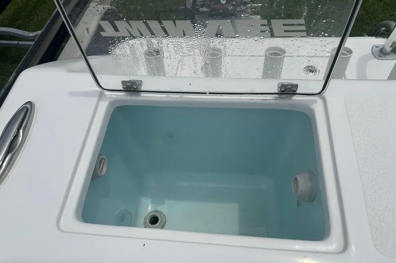 Slide: The Image of Livewell on 2023 Twin Vee 340 GFX CC boat, open lid, water inside. - 40
