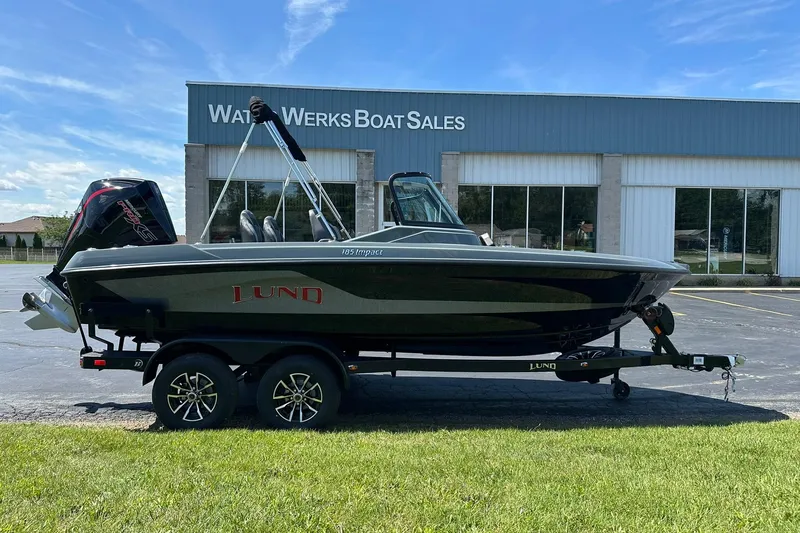 Slide: The Image of 2026 Lund 185 Impact GL boat on trailer at Water Werks Boat Sales. - 1