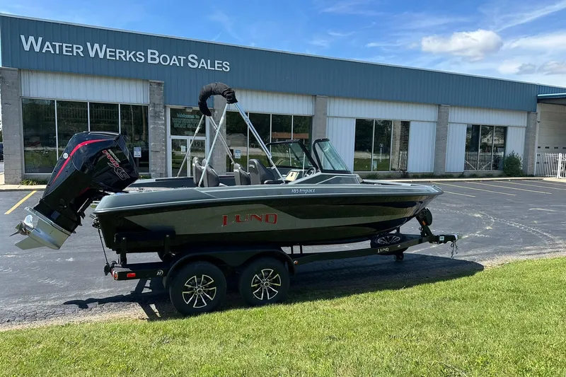 Slide: The Image of 2026 Lund 185 Impact GL boat on trailer at Water Werks Boat Sales. - 2