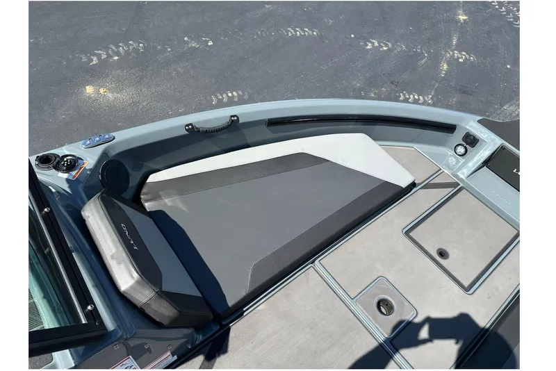 Slide: The Image of 2026 Lund 185 Impact GL boat interior with sleek seating and modern design. - 27