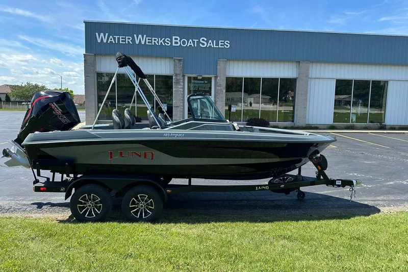 Slide: The Image of 2026 Lund 185 Impact GL boat on trailer at Water Werks Boat Sales. - 3